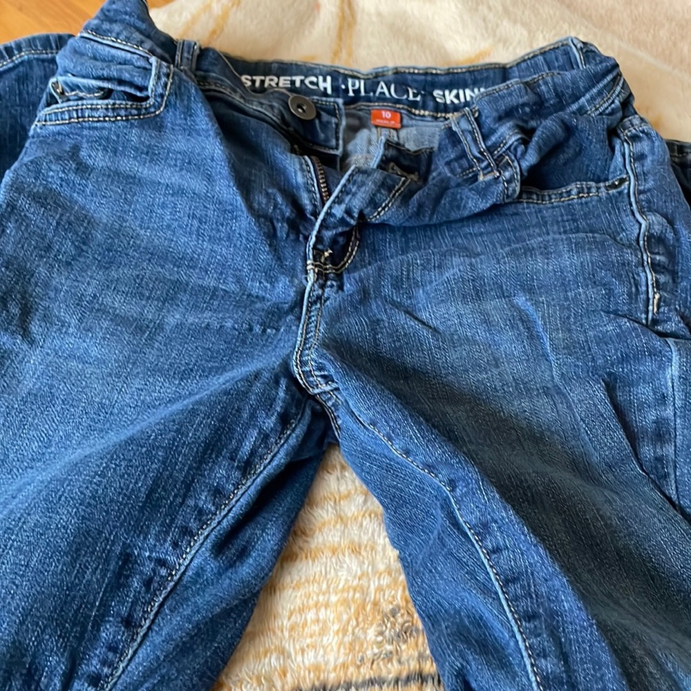 Children place skinny jeans